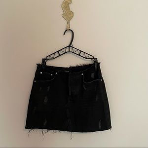 Black BDG distressed mini skirt with raw hem